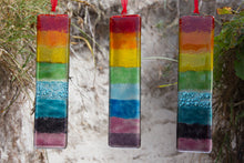 Load image into Gallery viewer, Long fused glass rainbow hanging plain and bubble handmade by Flow Glass in our studio in Orkney Islands Scotland