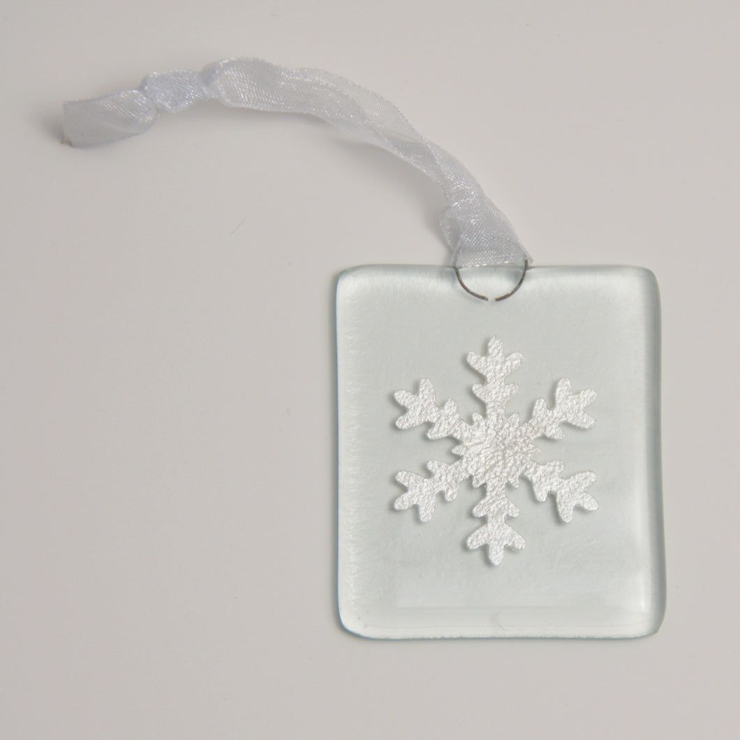 Silver snowflake hanging by Flow Glass Orkney Islands Scotland