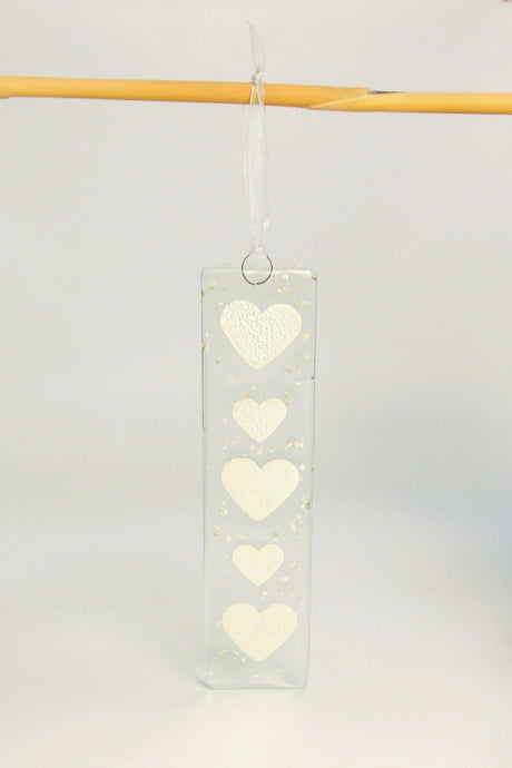 Long silver heart hanging by Flow Glass Orkney Isles Scotland