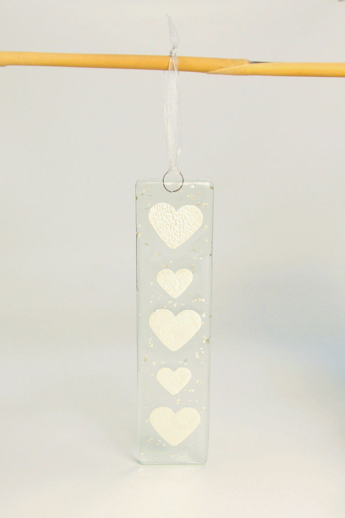 Long silver heart hanging by Flow Glass Orkney Isles Scotland