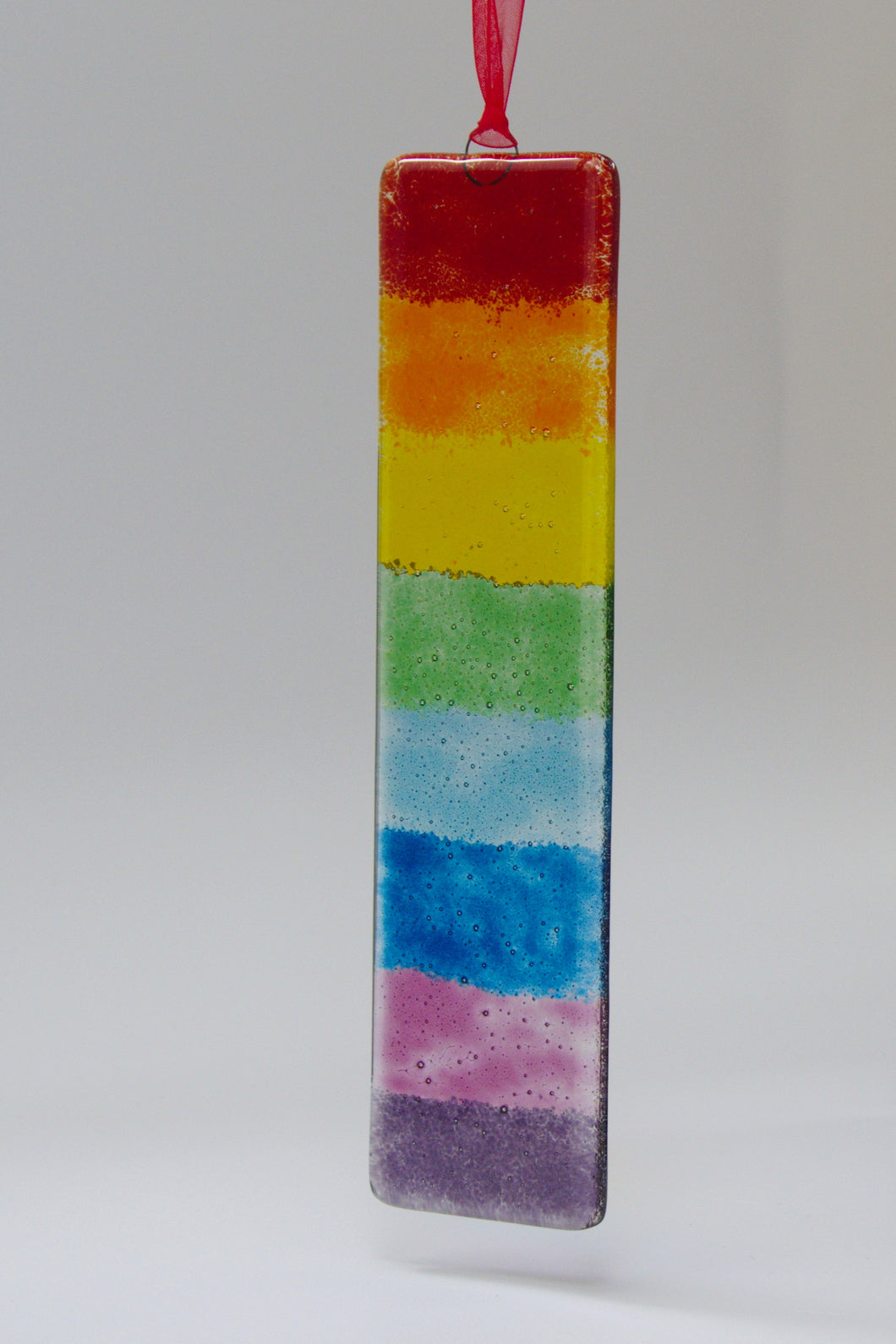 Long Fused Glass rainbow hanging by Flow Glass Orkney Islands Scotland
